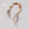 Close-up of 32cm colorful resin bead chain strap with printed silk scarf detail - Amber Beads with Black Pattern Scarf