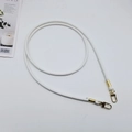 Close-up of a white PU leather round purse strap with golden metal swivel hooks - White + Gold Hook