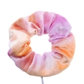 Macro shot of tie-dye velvet scrunchie in pink, orange and violet with ribbed texture - Tie-Dye Pink