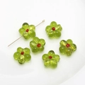 Macro shot of green glass flower beads with red centers for DIY jewelry making - 13# Green Small Flower