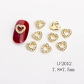 Macro detail of gold hollow heart nail gems with rhinestones and product dimensions - LF2012 Gold White Rhinestone Hollow Heart