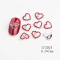 Detail view of 520 heart nail charm with red rhinestones and 9.5x7mm size markings - LF2024 Silver Red Rhinestone 520 Hollow Heart