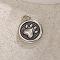 Silver round pendant featuring a raised cat paw design with fine radial textures - Paw Print Style / A0188 Silver