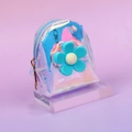Makroansicht der holografischen Mini-Rucksack-Geldbörse mit einer blauen Blume - Blau
