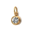 Detail of 6mm gold stainless steel charm with a clear round birthstone bezel setting - [Jump Ring] April White
