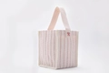 Detail of minimalist canvas tote with vertical red stripes and embroidery texture - Small