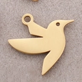 Gold stainless steel tropical bird pendant with polished mirror finish and eye detail - Hummingbird / Gold