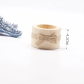 Detail of wooden napkin ring with jute rope bow, showing 4.2cm height measurement - Medium
