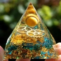 Orgone crystal pyramid with blue gravel, golden gears and yellow sphere inside - Tiger Eye Gear Blue Stone / Small
