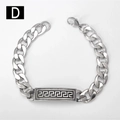 Detail of silver Cuban chain bracelet with black Greek Key engraved plate and lobster clasp - Style D-Greek Key / 18cm