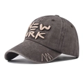 Side view of washed dark gray New York baseball cap with premium 3D embroidery detail - Coffee