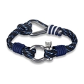 Macro view of woven paracord bracelet with stainless steel D-shackle buckle and knot detail - Blue