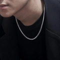 Men's 4mm vintage woven silver snake chain necklace displayed on a male model's neck - Necklace 60cm / Silver