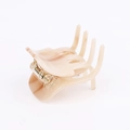 Elegant beige acetate bow-shaped hair claw clip with a glossy marble texture finish - Arc Hair Claw / Off White