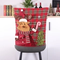 Christmas chair cover featuring reindeer appliqué and red plaid pattern on grey chair - Elk