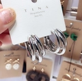 Detailed macro view of S925 sterling silver multi-layered hoop earrings with tassel design - KC Silver Color with Silver Needle