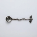 Detailed view of dragonfly handle design and hammered texture on metal dessert spoon - Gunmetal