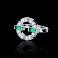 Detail view of silver ring with green emerald-cut stones and paved crystals - US 7 / Silver