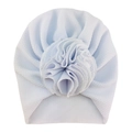 Detail of light blue baby turban hat with textured waffle knit and large flower decoration - One Size / No. 4 Bleached White