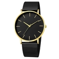 Minimalist quartz watch with black dial, gold case, and black mesh steel strap - Gold Hand Black Dial Gold Case Black Strap