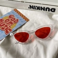 Detailed view of trendy transparent cat-eye sunglasses with vibrant red tinted lenses - Cat Eye / Transparent Frame Red Lens
