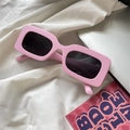 Chunky hot pink rectangular sunglasses with dark lenses on aesthetic white fabric - Matte Square