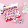 Close-up of 30pcs box of high clean erasers for students on a pink desk background - 30pcs/box / Rainbow Striped Eraser