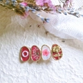 Detailed close-up of handmade hairpin featuring real dried flowers, pearls, and golden rose - Rose Red