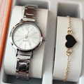 Detailed view of silver quartz watch and golden heart bracelet in a white jewelry box - Silver Watch Black Heart Bracelet Set