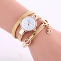 Women's gold quartz watch with wrap-around mesh band and rhinestone dial details - Beige