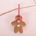 Felt gingerbread man Christmas ornament with red checkered bow and white hearts - Gingerbread Boy Ornament