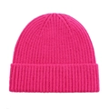 Macro view of bright fuchsia knitted beanie featuring thick ribbed texture and wide cuff - One Size / Rose Red