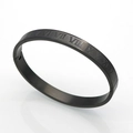 Detail shot of black matte titanium steel bracelet featuring engraved Roman numerals - 8MM Roman Numerals Bangle Black