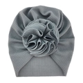 Detail of grey baby headband featuring waffle knit texture and a large 3D fabric flower - One Size / No.2 Grey