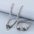Punk style silver skull jewelry set featuring a woven chain necklace and bracelet - Bracelet 19cm + Necklace 45cm / Silver