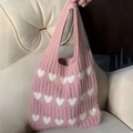 Pink knitted tote bag with white heart pattern and braided cable texture in medium size - Pink with White Heart - Three Rows