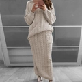 Detail shot of oatmeal knit sweater set showing classic cable knit texture and fabric - Apricot