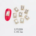 Detail of 6.5x8.5mm octagonal K9 glass nail rhinestones with gold base and AB crystal frame - Gold Frame Transparent AB Edge Rectangle Style (5209)