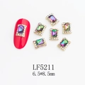 Macro detail of K9 glass nail rhinestones in octagon shape with gold metal base - Gold Frame AB Sparkle Rectangle Style (5211)