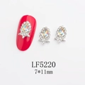 Detailed view of 7x11mm teardrop nail rhinestones with iridescent stones and silver base - Silver Frame AB Aurora Water Drop Style (5220)