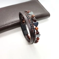 Dettaglio bracciale doppio strato in pelle marrone con occhio di tigre e cuore in ematite - Bracciale a Cuore Occhio di Tigre Rosso 21cm