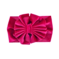 Detailed view of large magenta velvet bow headband with soft elastic fabric texture - No. 13 Rose Red