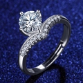 Close-up of a sparkling zircon ring with classic four-prong setting and wave band detail - Adjustable / Style 14 Wave Band Ring (1 Carat)