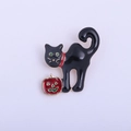 Enamel Halloween brooch featuring a black cat on a Jack-o'-lantern with gold plating - YNCP4839 Black