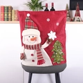 Christmas red burlap chair cover featuring a cute snowman and green tree design - Snowman