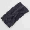 Close-up of dark grey chunky knit headband featuring a bohemian twisted knot bow texture - Dark Gray