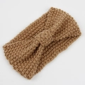Detailed close-up of camel corn-knit headband with twist bow knot and chunky texture - Camel