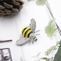 Elegant bee brooch with sparkling rhinestones and yellow enamel wings on white surface - Silver Base White Wing Enamel Style