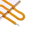 Dettaglio macro della catena in acrilico giallo con ganci in silicone antiscivolo - Giallo brillante