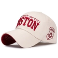 Beige baseball cap with red Boston embroidery and cotton twill texture shown from 45-degree angle - Light Beige